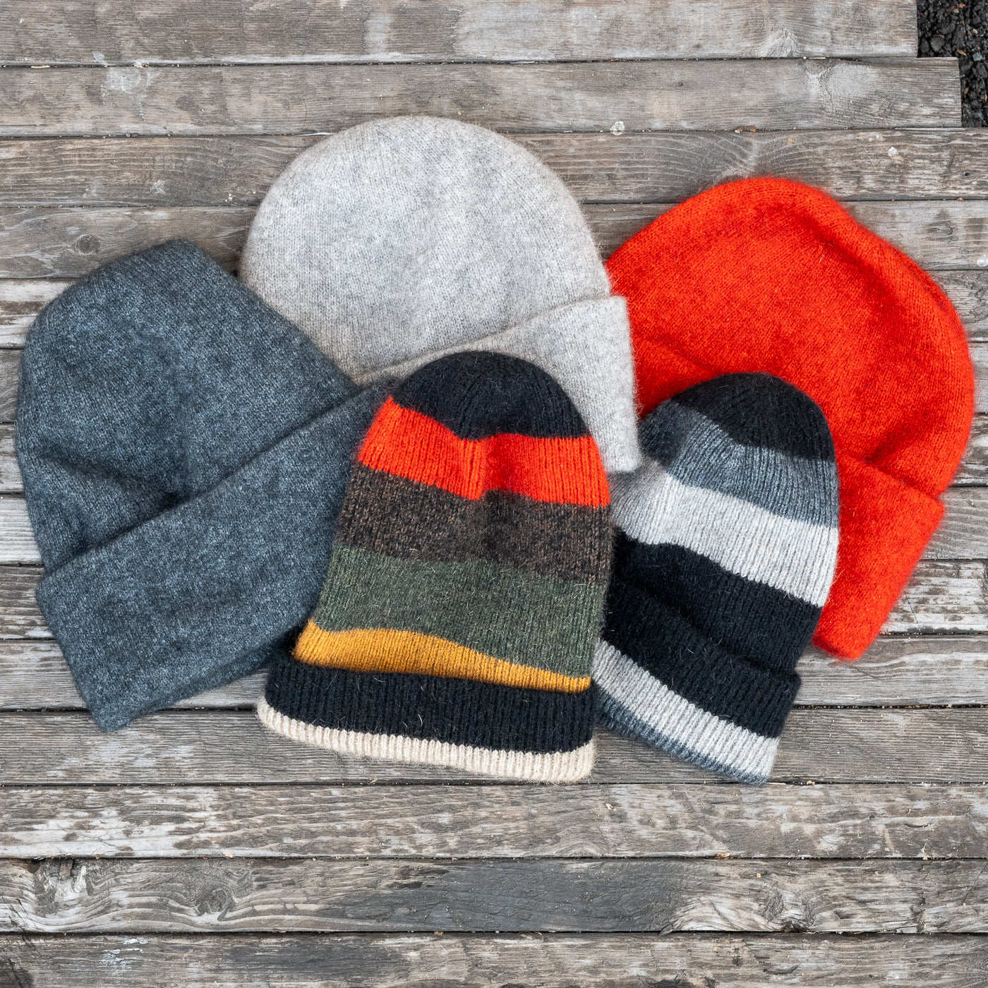 Possum Merino Wool Beanies: Assorted styles and colors.